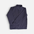 Navy blue button varsity terry jacket folded flat lay